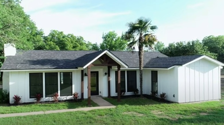 White bead and batten siding house