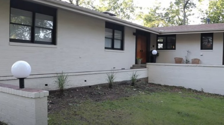 White paint on brick house