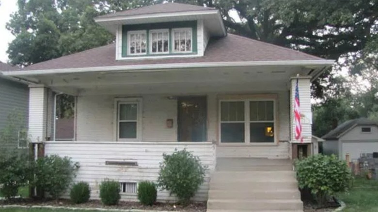 Faded and peeling house