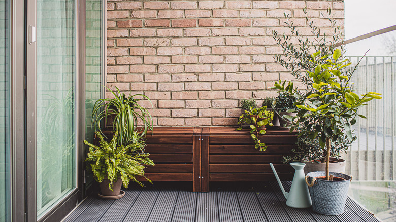 wooden storage bench on porch