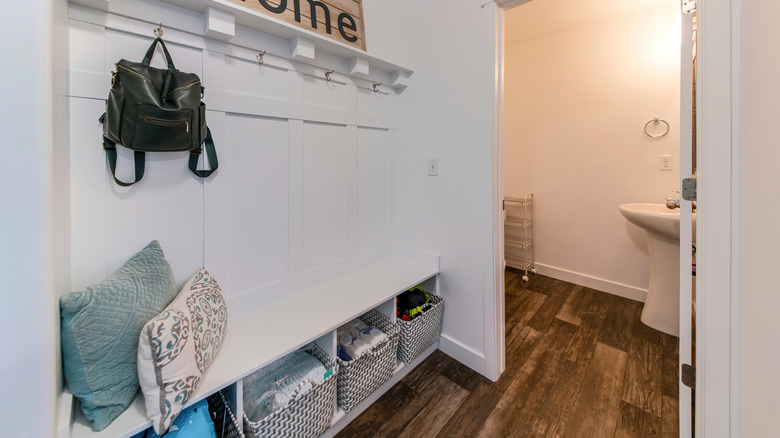 bench with hooks in mudroom