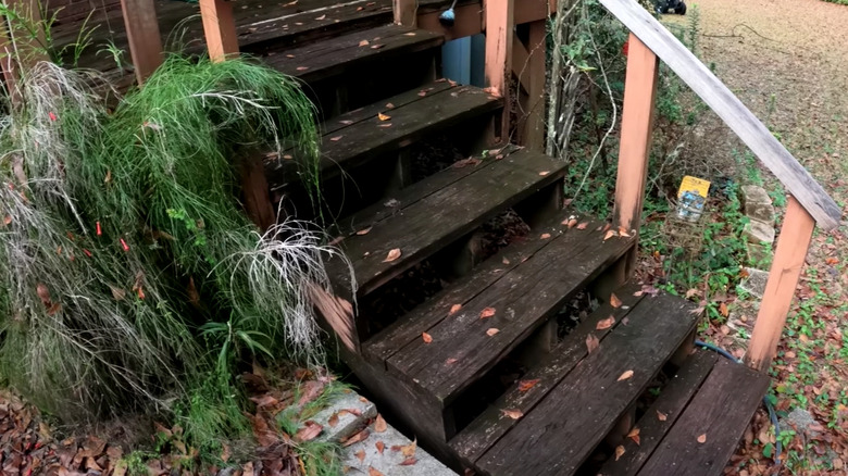 dirty dark brown wood stairs