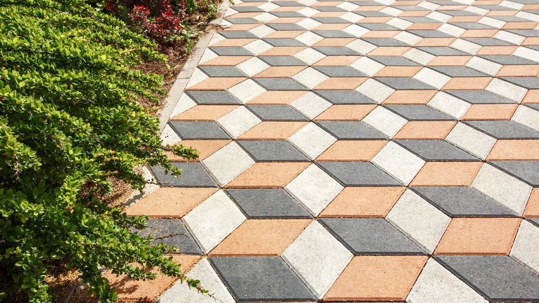 diamond-shaped paving tiles in garden