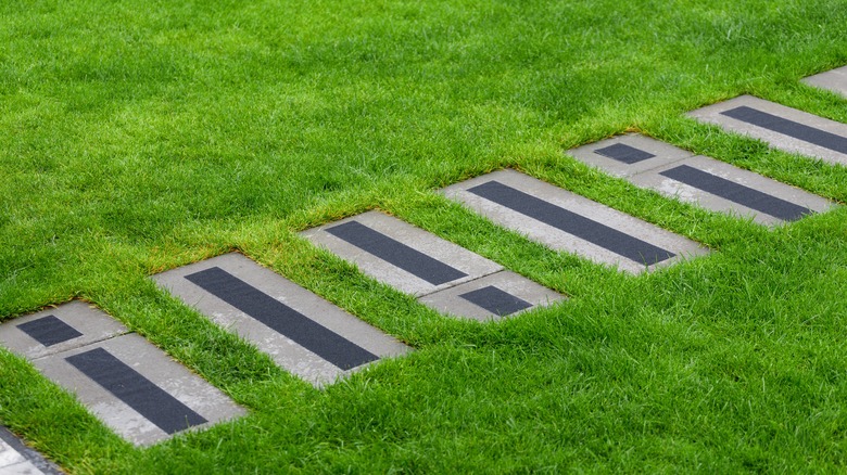 tiled walkway in lawn