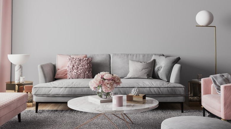 grey room with pink decor