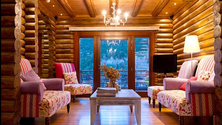 Traditional furniture in log cabin