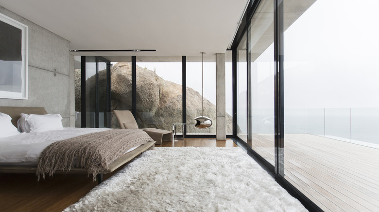 Bedroom with rock and water