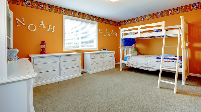 orange room with bunk beds