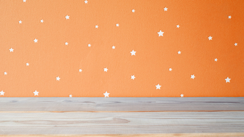 orange wallpaper with stars