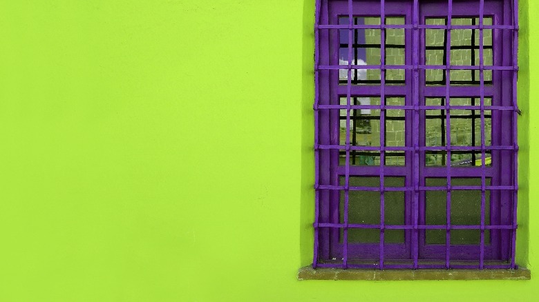Green wall with purple window