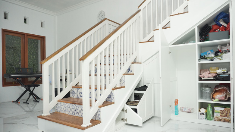 Oak trim on white staircase