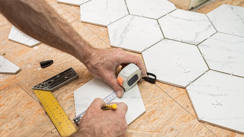 Laying tile floors