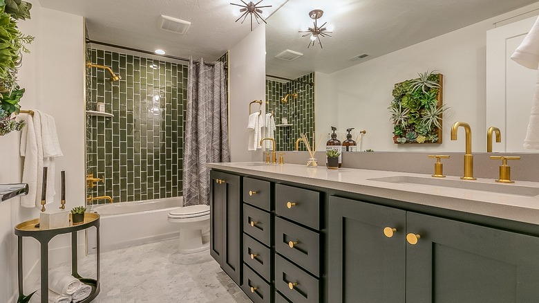 Bathroom with green tile