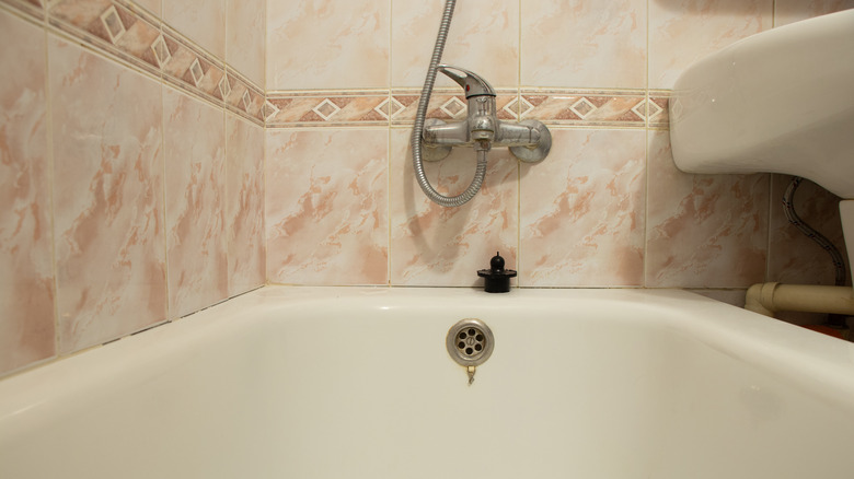 Pink marble bathtub surround