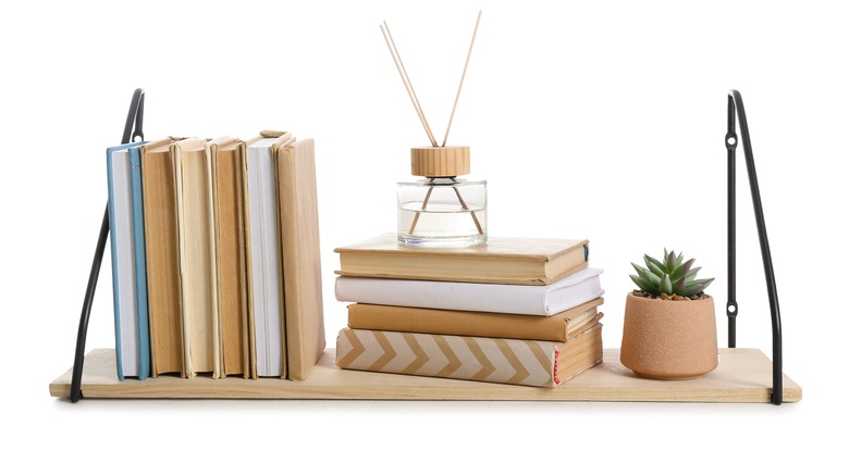 bracketed shelf with books