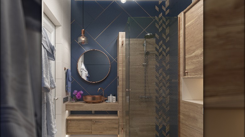 Navy blue bathroom accent wall