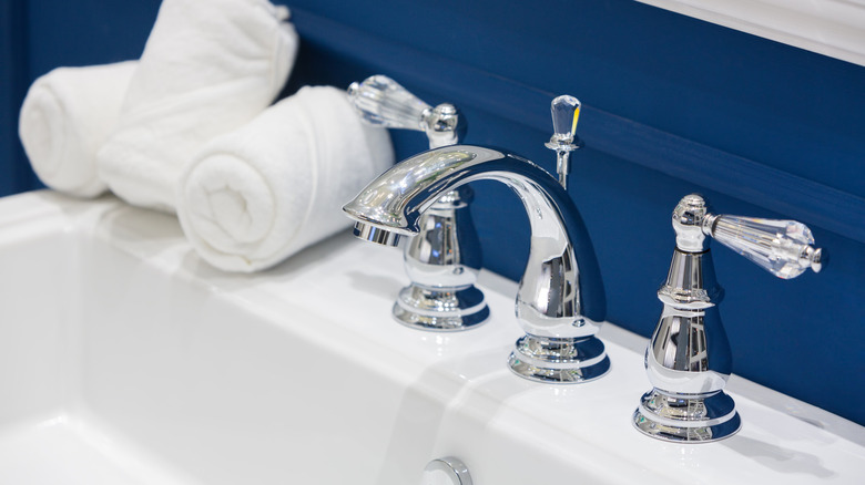 Navy blue wall bathroom sink