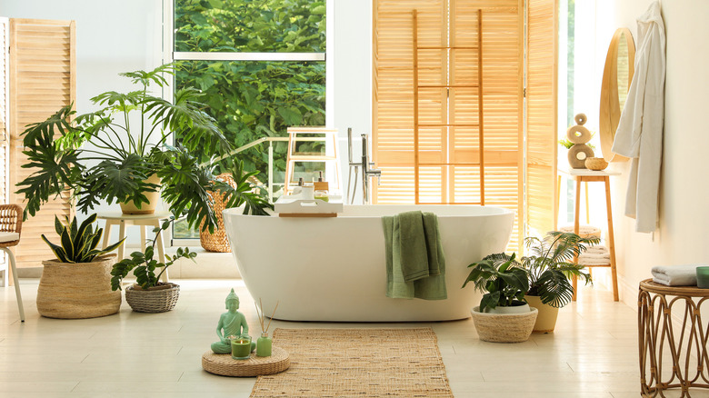 bathroom with sculptures and plants