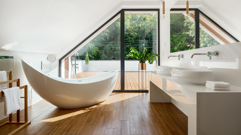 bathroom with a tub