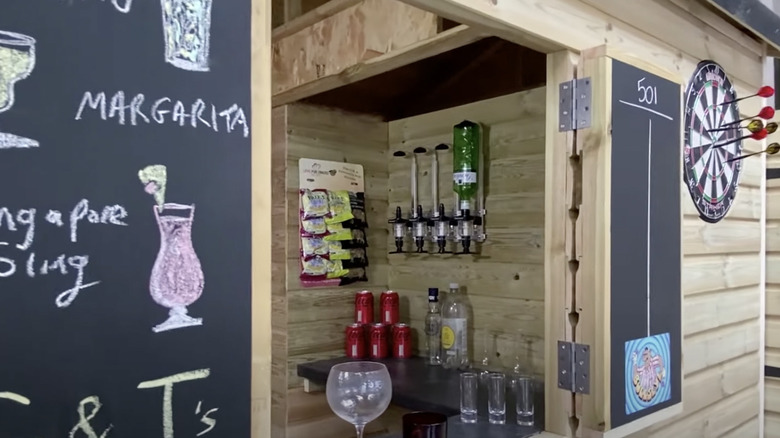 shed bar with a chalkboard wall