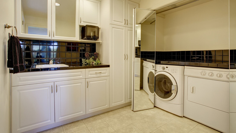 Sliding mirror doors laundry room