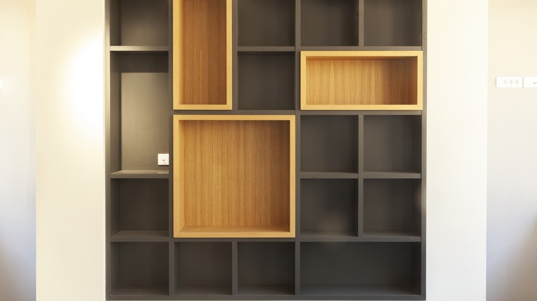 https://www.housedigest.com/img/gallery/20-smart-box-shelf-ideas-that-will-upgrade-your-rooms-organization/intro-1679065531.jpg