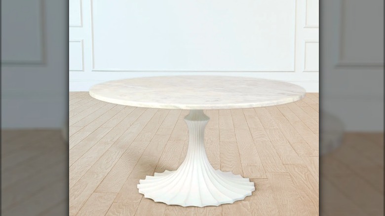 Skirted marble dining table