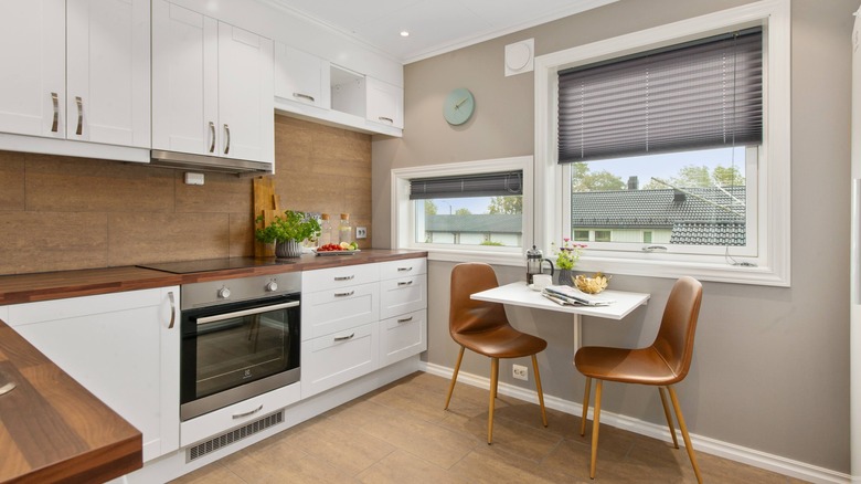 white kitchen with wood