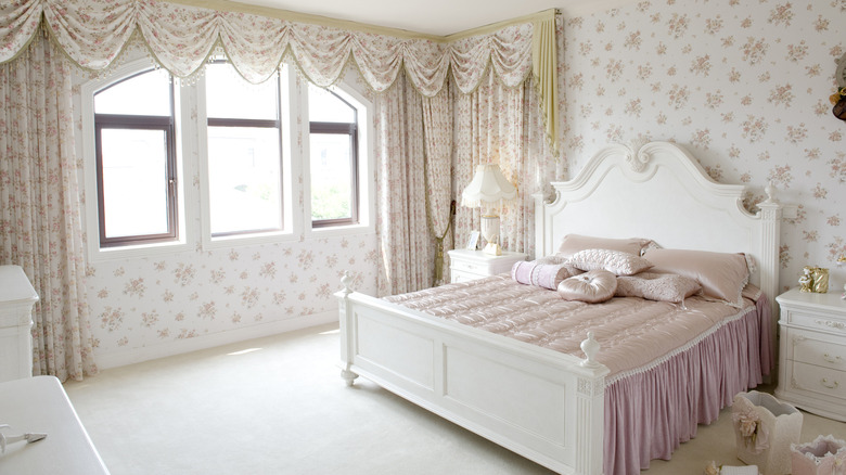 bedroom with elegant wallpaper