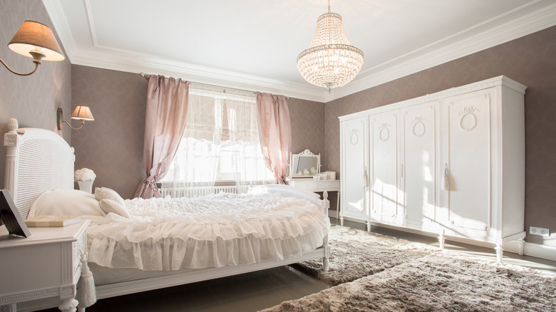 bedroom with a chandelier