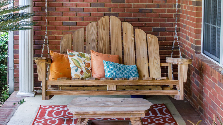 wooden front porch hanging bench
