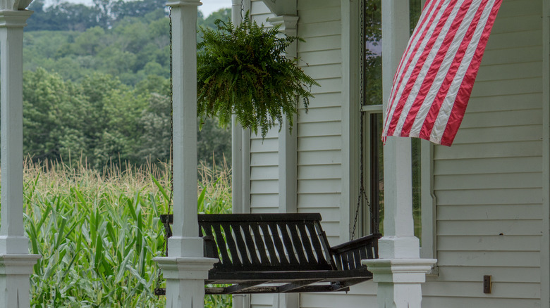 black bench on front porch