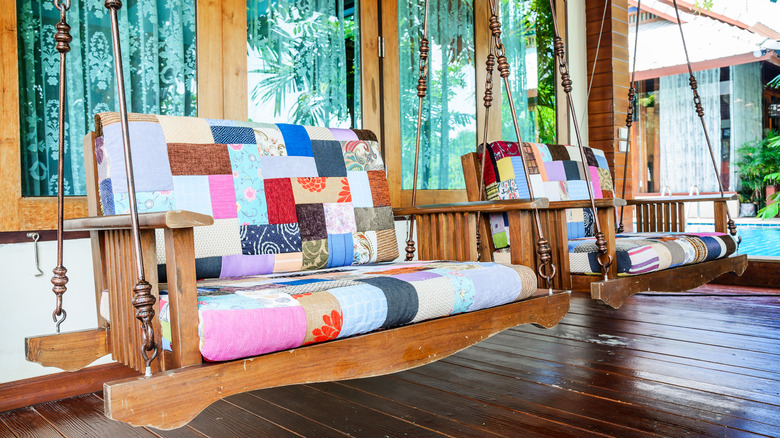 colorful patchwork cushions on benches