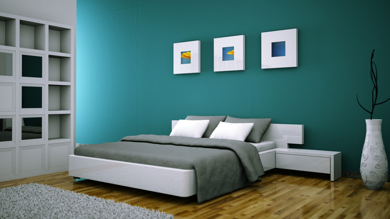 Modern and minimalist teal bedroom