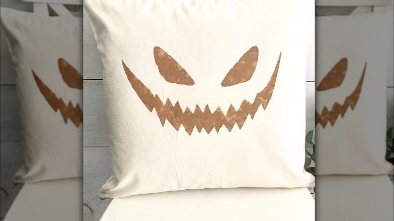 jack-o'-lantern face on pillow