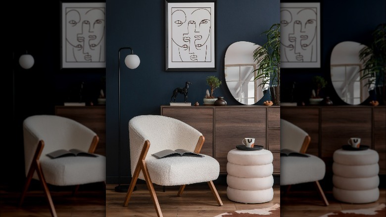 Dark blue walls white furniture