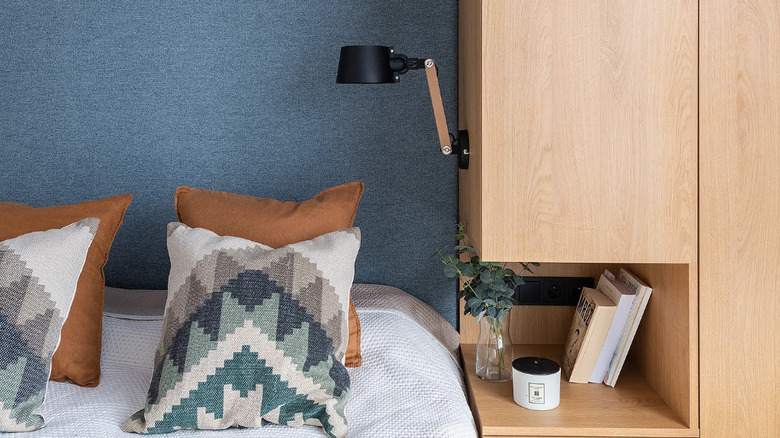 Bed with built-in shelf