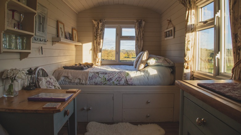 small bedroom with panelled walls