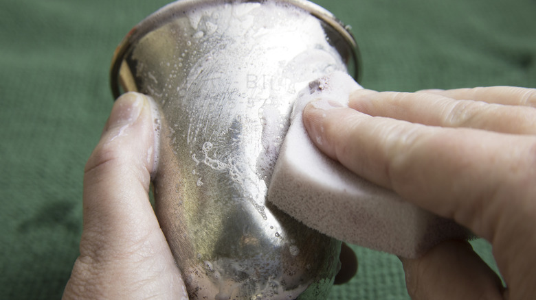 polishing a metal piece