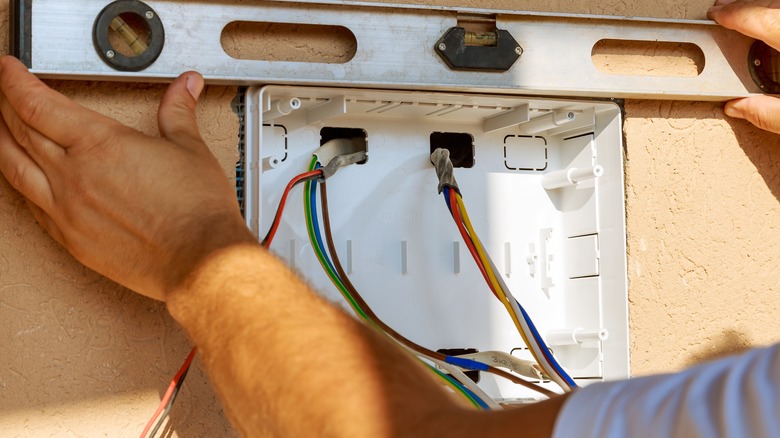 Wires in cabinet hole