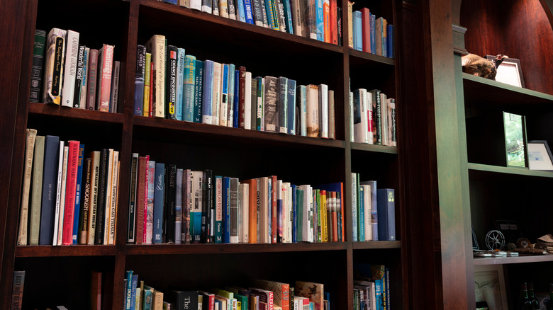 Traditional bookshelf with decor beside it