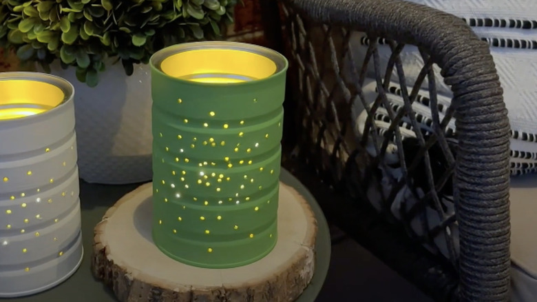 Outdoor lights made from repurposed coffee tins.