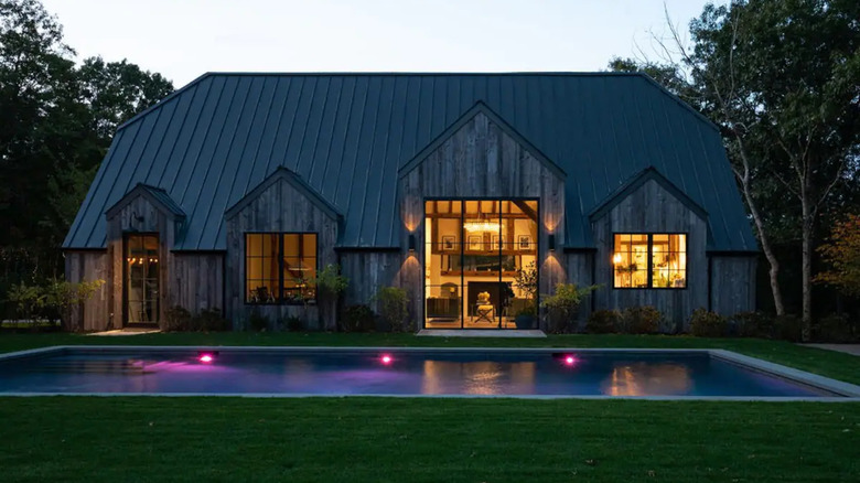 modern barn with a pool