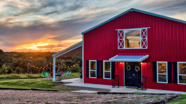 modern red barn with yard