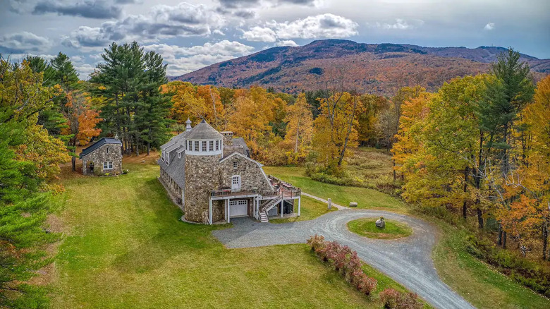 updated barn surrounded by trees