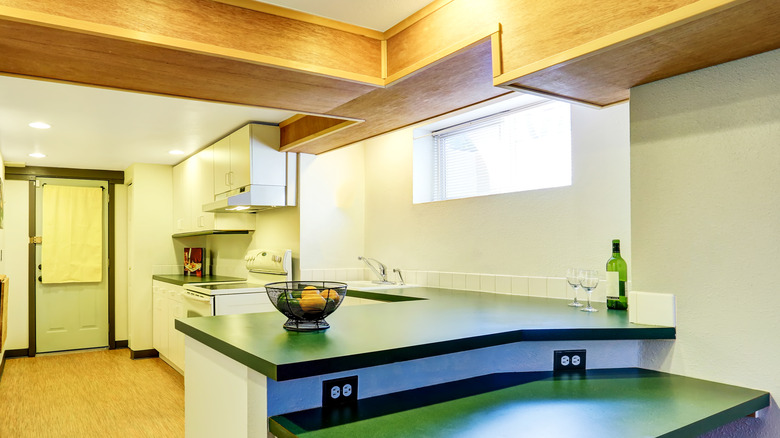 Basement window over kitchen sink