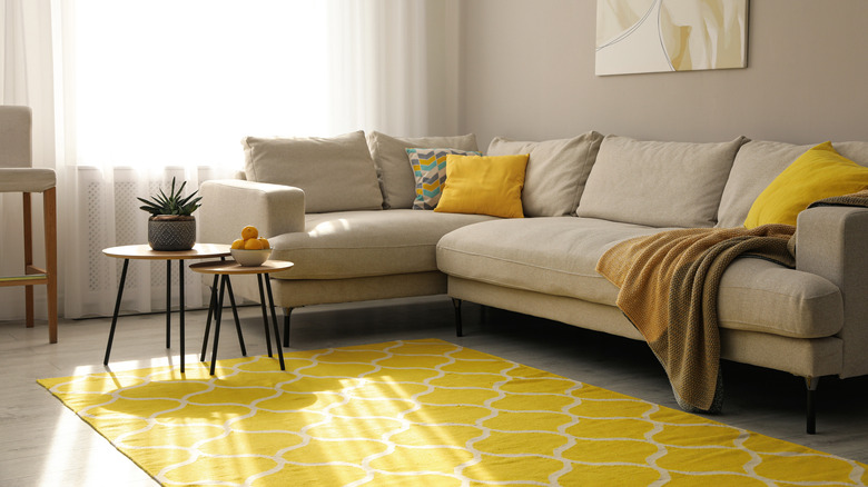 yellow rug in living room