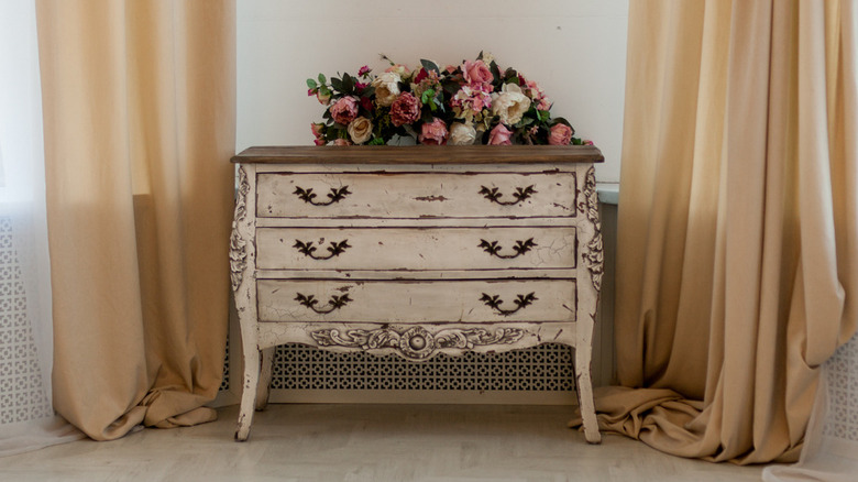 dresser with flowers