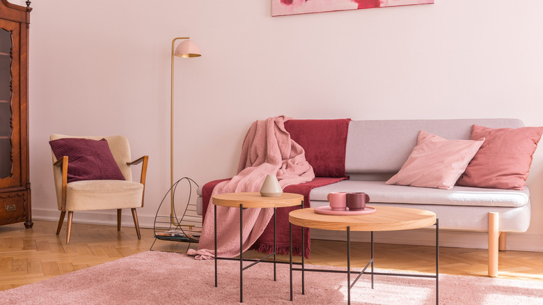 millennial pink paired with dark and light decor