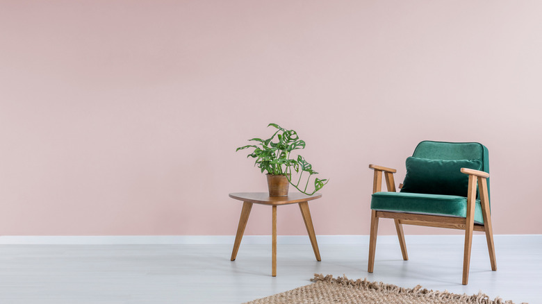 millennial pink paired with emerald chair